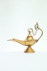 brass oil lamp on white background