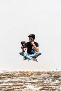 man siting while reading