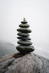 gray stones stacked on gray rock