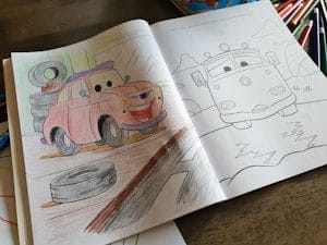 childs book with drawing of a car